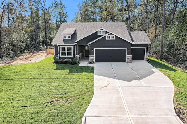 craftsman inspired home with a garage and a front lawn