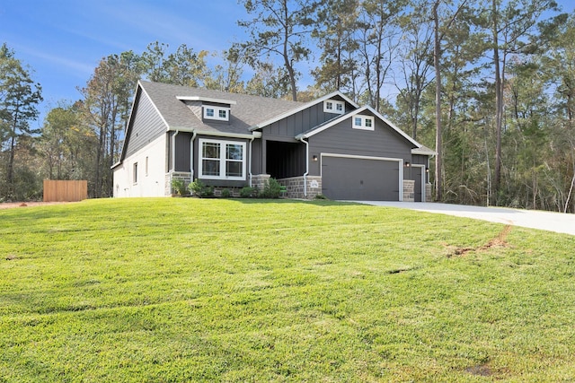 craftsman-style home with a garage and a front lawn