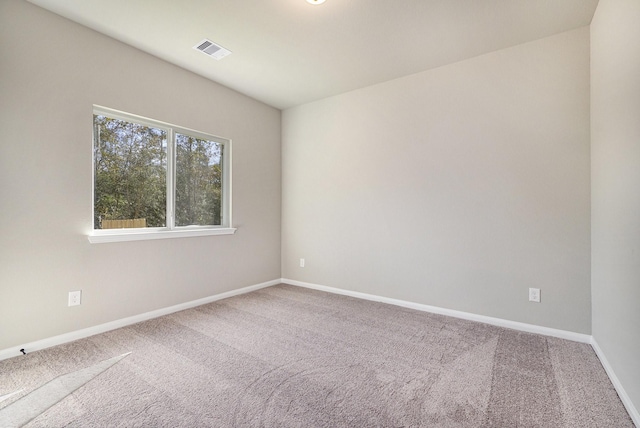 empty room with carpet flooring