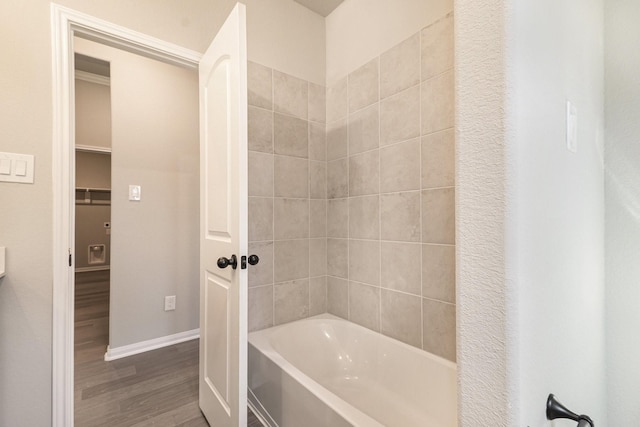 bathroom with hardwood / wood-style floors