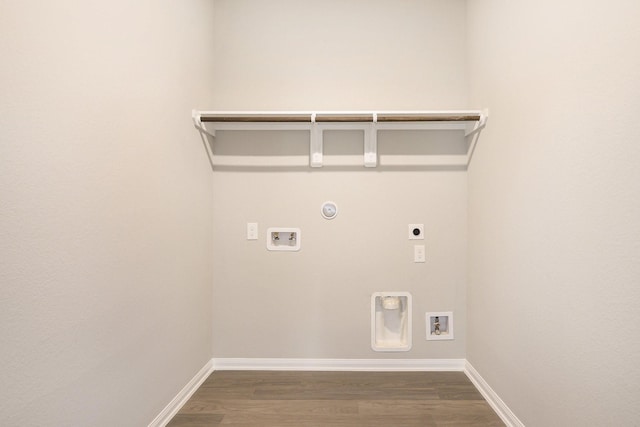 washroom with hookup for an electric dryer, hookup for a gas dryer, dark hardwood / wood-style floors, and hookup for a washing machine