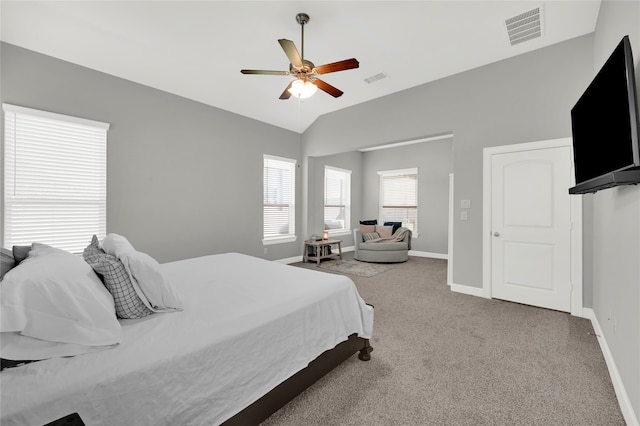 carpeted bedroom featuring ceiling fan and lofted ceiling