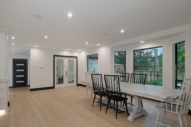 dining area with light wood-type flooring