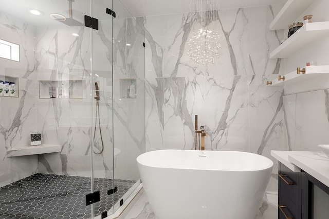 bathroom featuring tile walls, vanity, and plus walk in shower