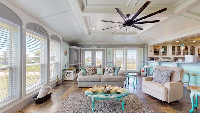 living room featuring french doors, ceiling fan, coffered ceiling, beamed ceiling, and ornamental molding