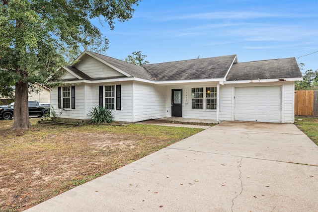 ranch-style home with a garage