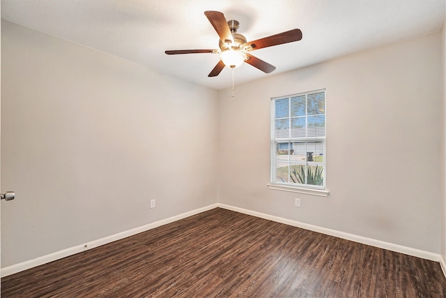 unfurnished room featuring dark hardwood / wood-style floors and ceiling fan