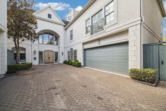 view of front of property featuring a garage