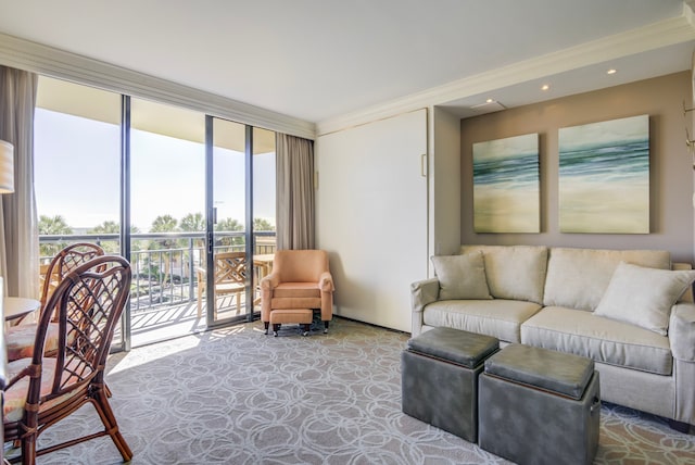 living room with expansive windows, ornamental molding, and a healthy amount of sunlight