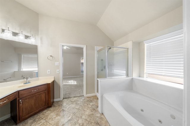 bathroom with vanity, tile patterned floors, lofted ceiling, and shower with separate bathtub