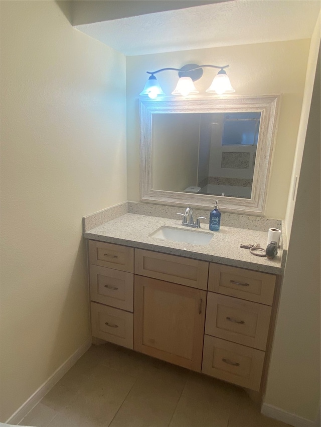 bathroom featuring vanity and tile patterned floors