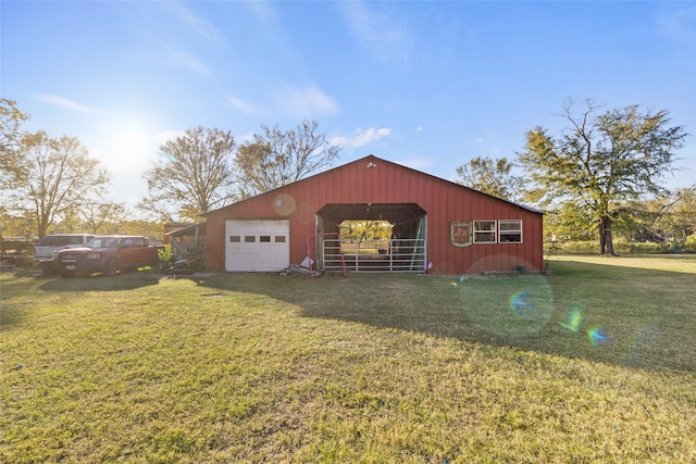 view of outbuilding featuring a lawn