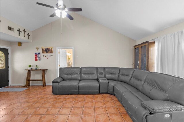 living room featuring high vaulted ceiling, light tile patterned floors, and ceiling fan