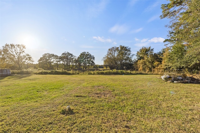 view of yard with a rural view