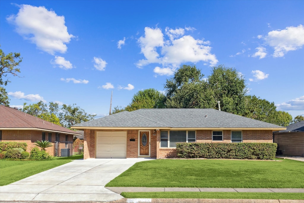 5206 Lido Ln, Houston, TX 77092 - single story home with a front yard and a garage