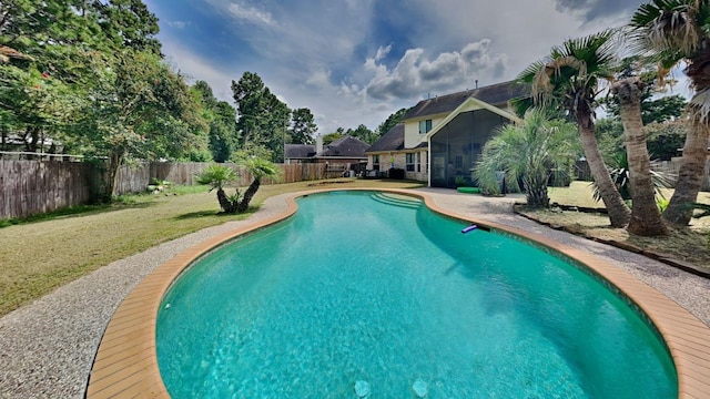 5802 Sugar Bush Dr, Magnolia, TX 77354 - view of swimming pool featuring a fenced backyard, a sunroom, a fenced in pool, and a yard