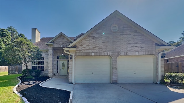 view of front of property with a garage