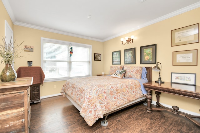 bedroom with dark hardwood / wood-style flooring, ornamental molding, and a chandelier