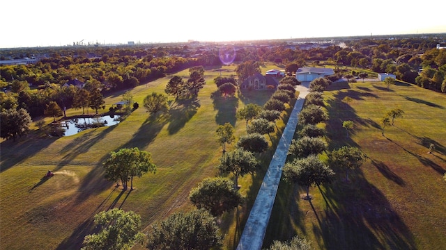 drone / aerial view featuring a water view and a rural view