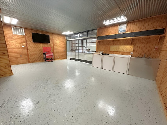 623 Barkaloo Rd, Baytown, TX 77521 - garage with wood walls