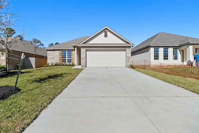 ranch-style house with a front lawn and a garage