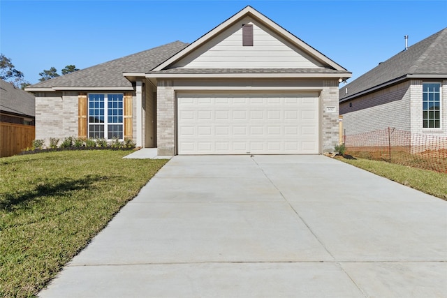 ranch-style house with a garage and a front yard