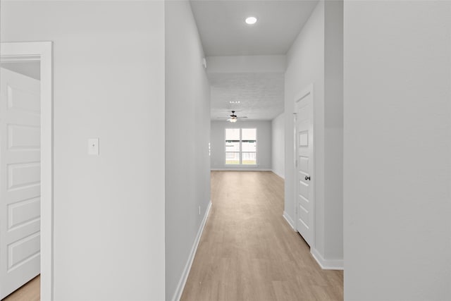 hallway featuring light wood-type flooring