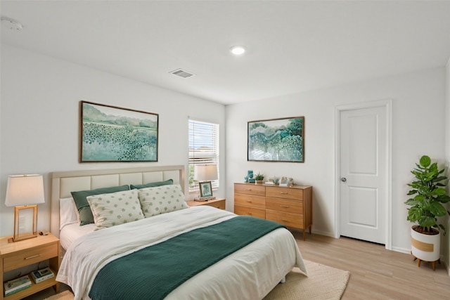 bedroom featuring light hardwood / wood-style flooring