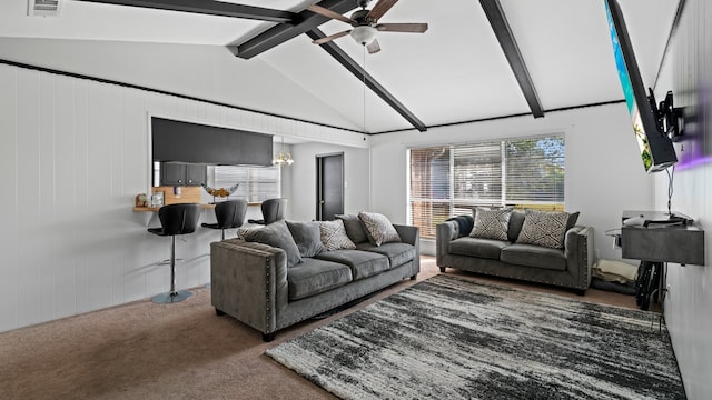 living room with lofted ceiling with beams, ceiling fan, and dark colored carpet