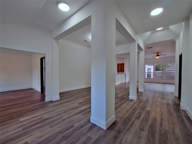 hallway with dark hardwood / wood-style flooring and ornamental molding