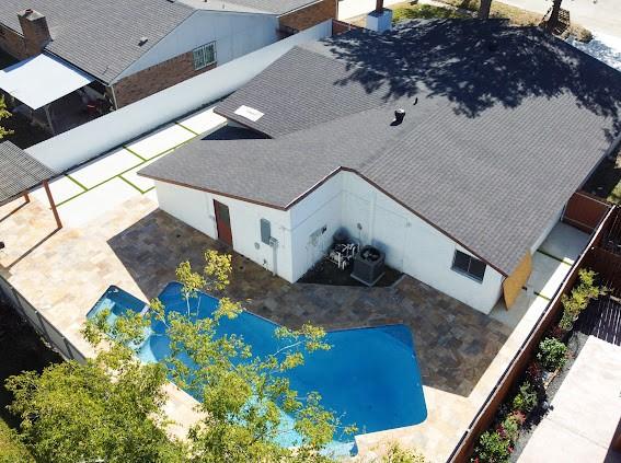 7311 La Mesa Dr, Houston, TX 77083 - view of subject property with a pool area