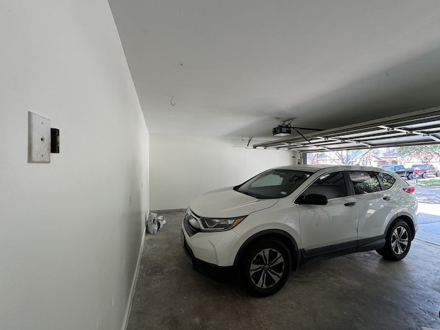 garage featuring a garage door opener