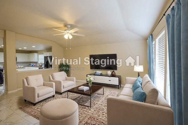 living room with lofted ceiling and ceiling fan