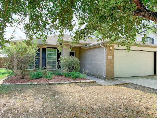 single story home with a garage