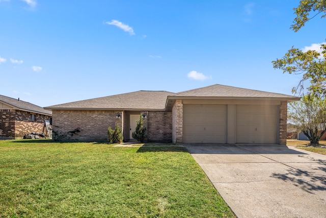 ranch-style house with a garage and a front yard