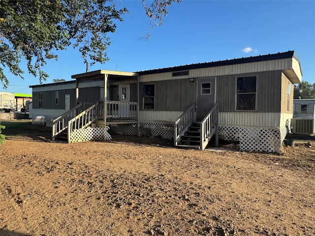 manufactured / mobile home featuring central AC unit