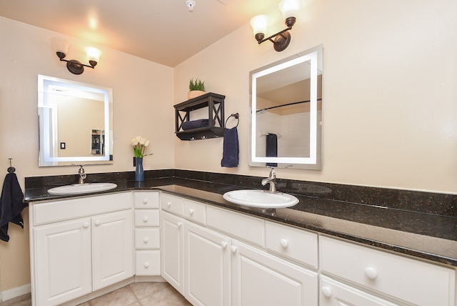 bathroom featuring vanity and tile patterned flooring