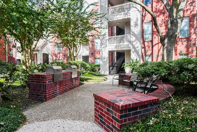 view of home's community featuring a patio area