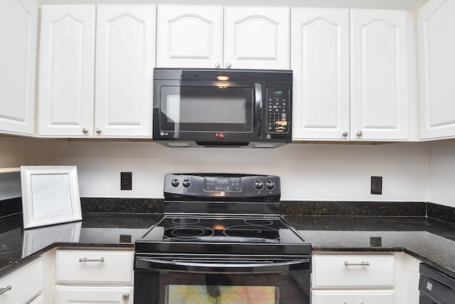 kitchen featuring dark stone countertops, white cabinetry, and black appliances