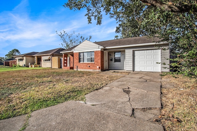 single story home featuring a front yard and a garage