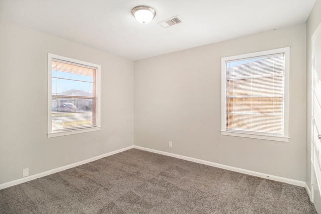 unfurnished room with carpet