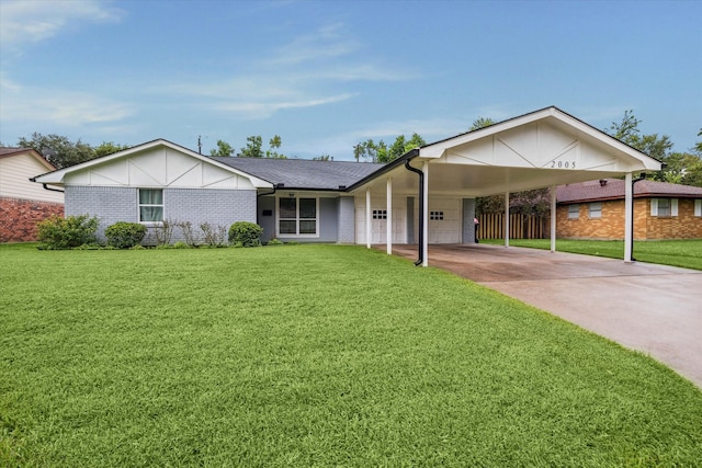 ranch-style home with a front yard and a garage