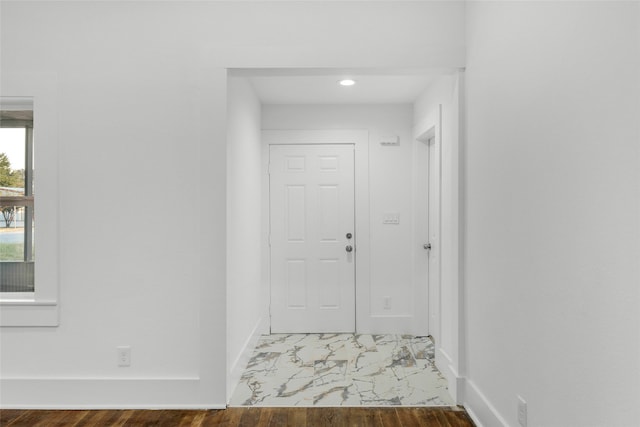 interior space with dark hardwood / wood-style floors