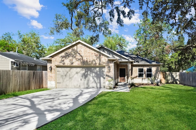 view of front facade featuring a front yard and a garage