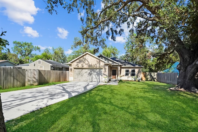 ranch-style home featuring a front yard and a garage