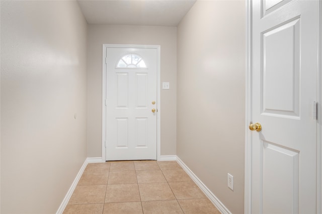 entryway featuring light tile patterned flooring