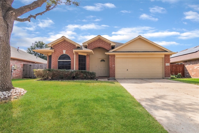 ranch-style house with a garage and a front lawn