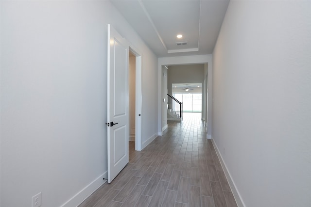 hallway featuring hardwood / wood-style flooring