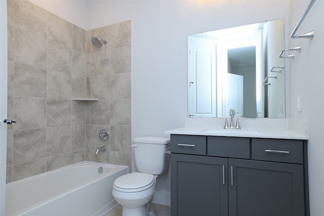 full bathroom featuring vanity, tiled shower / bath combo, and toilet