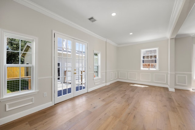 unfurnished room featuring french doors and a wealth of natural light